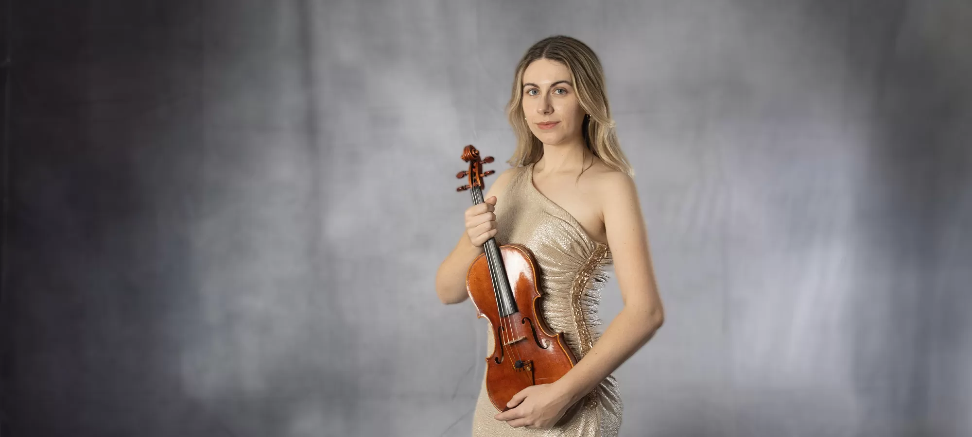 Kendra Sobania holding violin